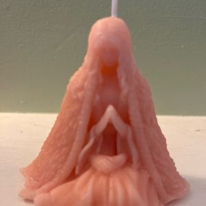 Praying goddess candle
